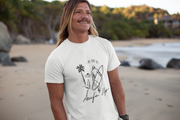 a man standing on a beach next to the ocean