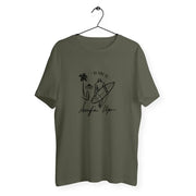 a green t - shirt with a picture of a surfer on it